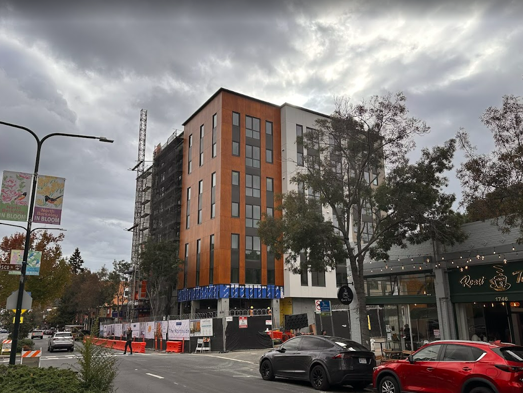 A seven-story, 72-unit apartment building under construction in Berkeley — part of a recent surge in housing development driven by zoning changes and evolving public support. Photo courtesy of Panoramic Interests.