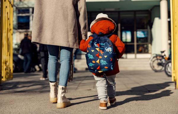 Parent walking child to school