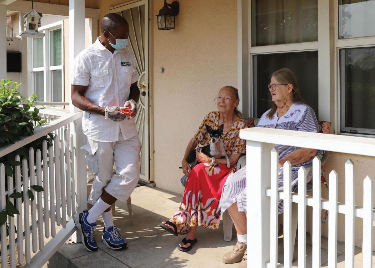 Man talking to seniors