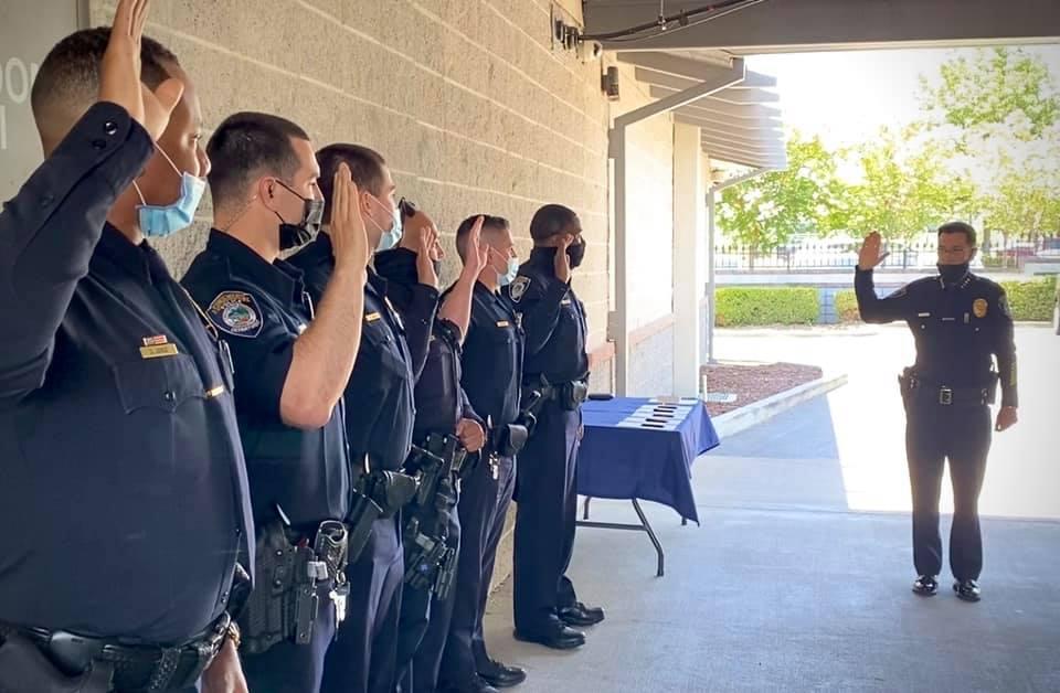 Police chief swearing in officers