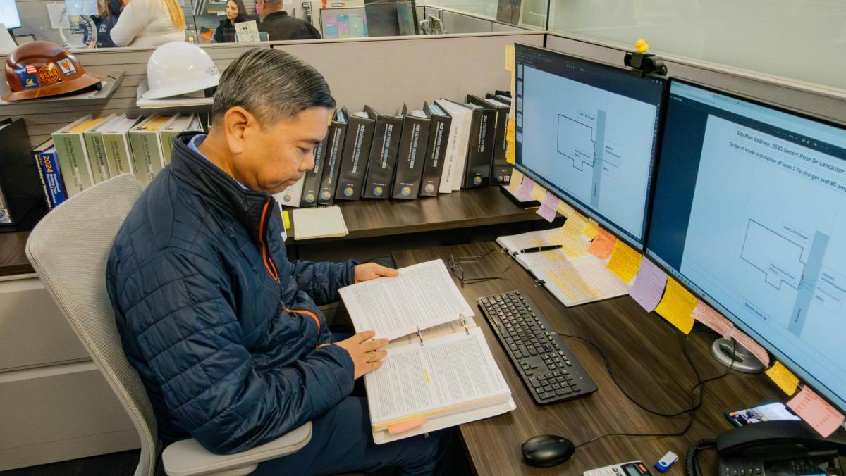 Planner looking at documents