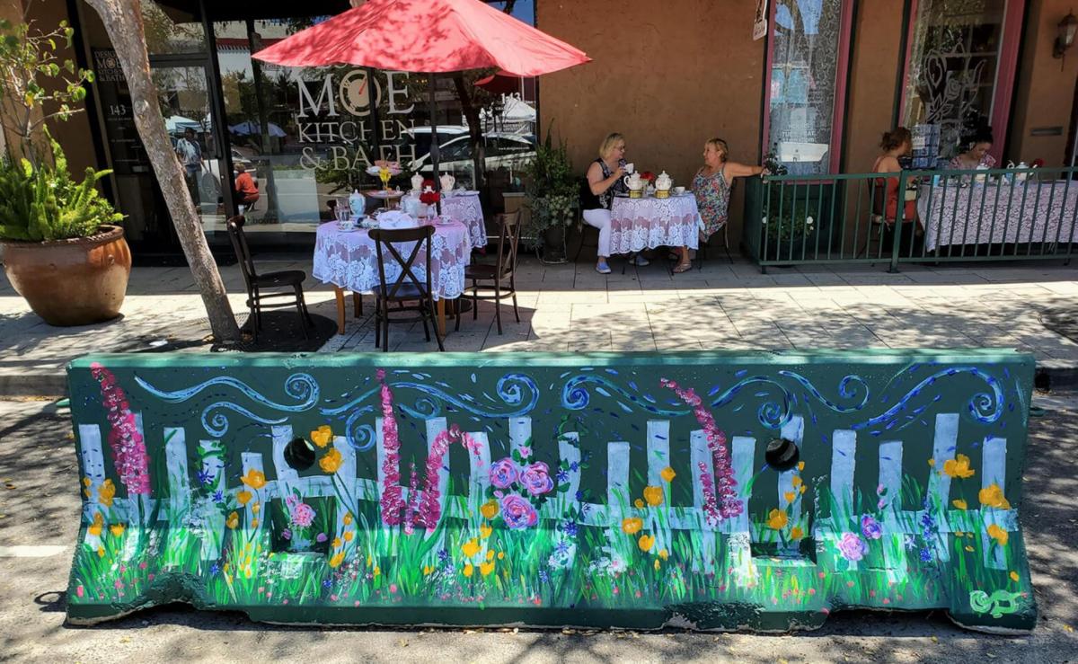 A floral-patterned barrier outside of the Grand Tea Room in downtown Escondido. 