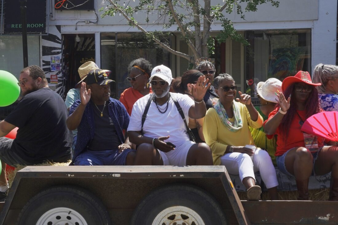 Cal Cities Executive Director and CEO Carolyn Coleman takes part in a parade while visiting her hometown of Lawrence, Kansas, during summer 2026.