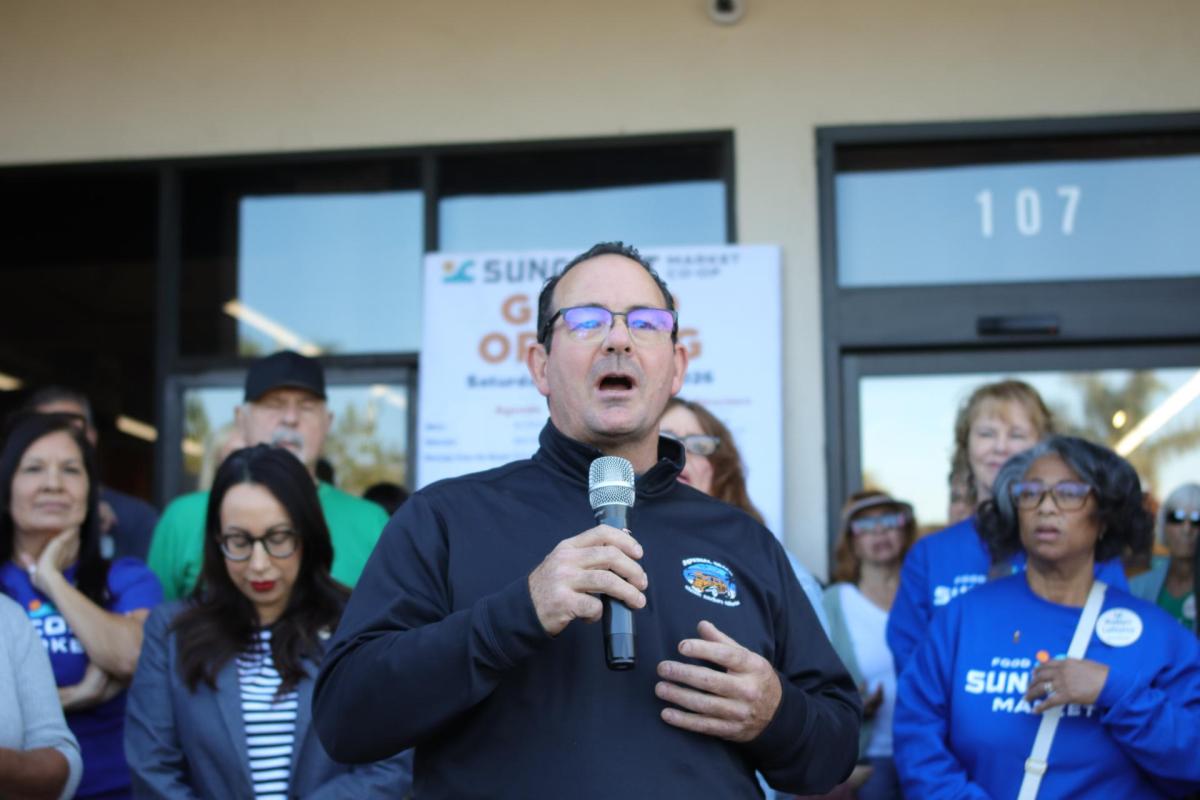 Imperial Beach Mayor Pro Tem Jack Fisher addresses the crowd at SunCoast Market Co-op's opening. Fisher, a chef by trade, championed the city's $500,000 investment that helped bring the $4 million project to life.