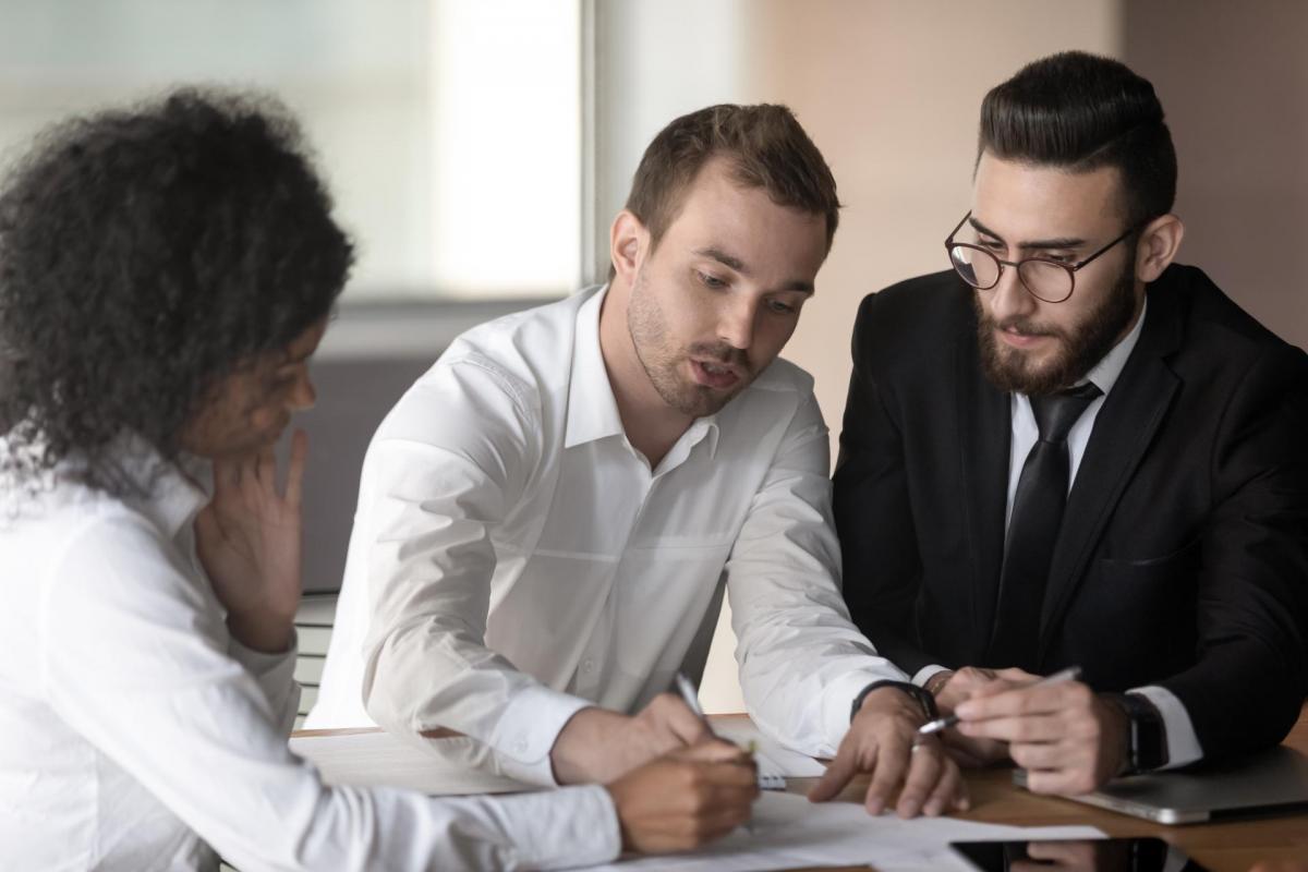 Professionals reviewing finances