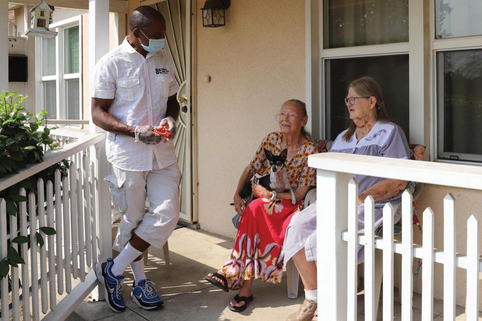 Man talking to seniors