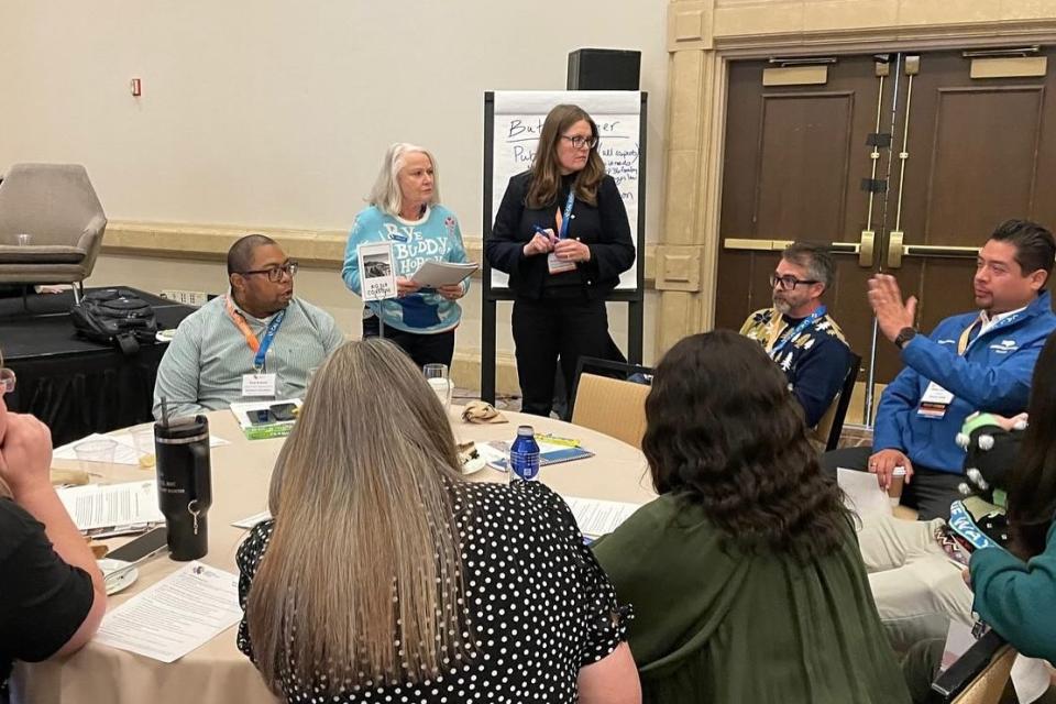 City leaders collaborating around a table