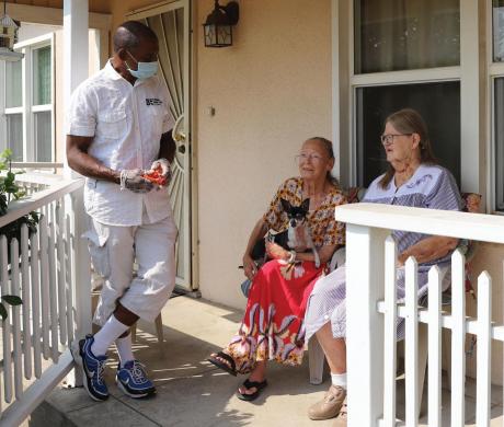 Man talking to seniors