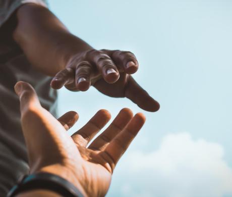 Hand reaching for support