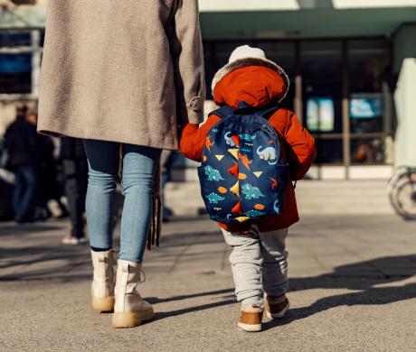 Parent walking child to school