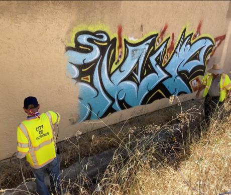 City of Escondido public works employees remove graffiti. 