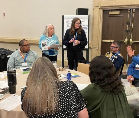 City leaders collaborating around a table