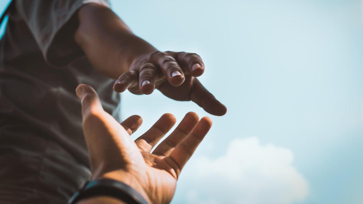 Hand reaching for support