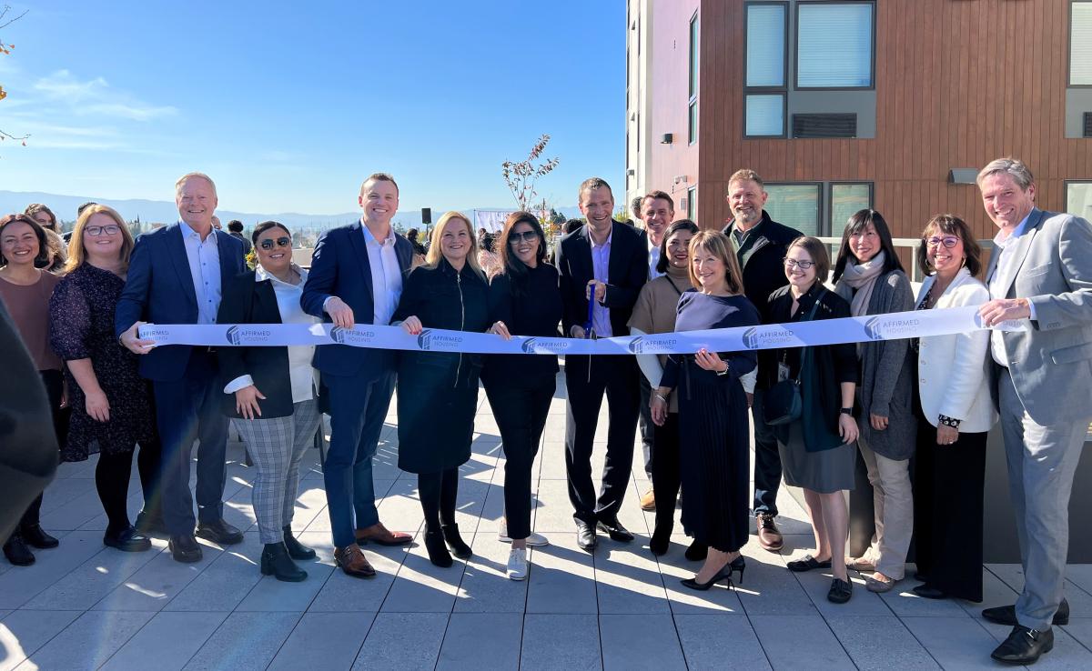 Community leaders gather for ribbon cutting